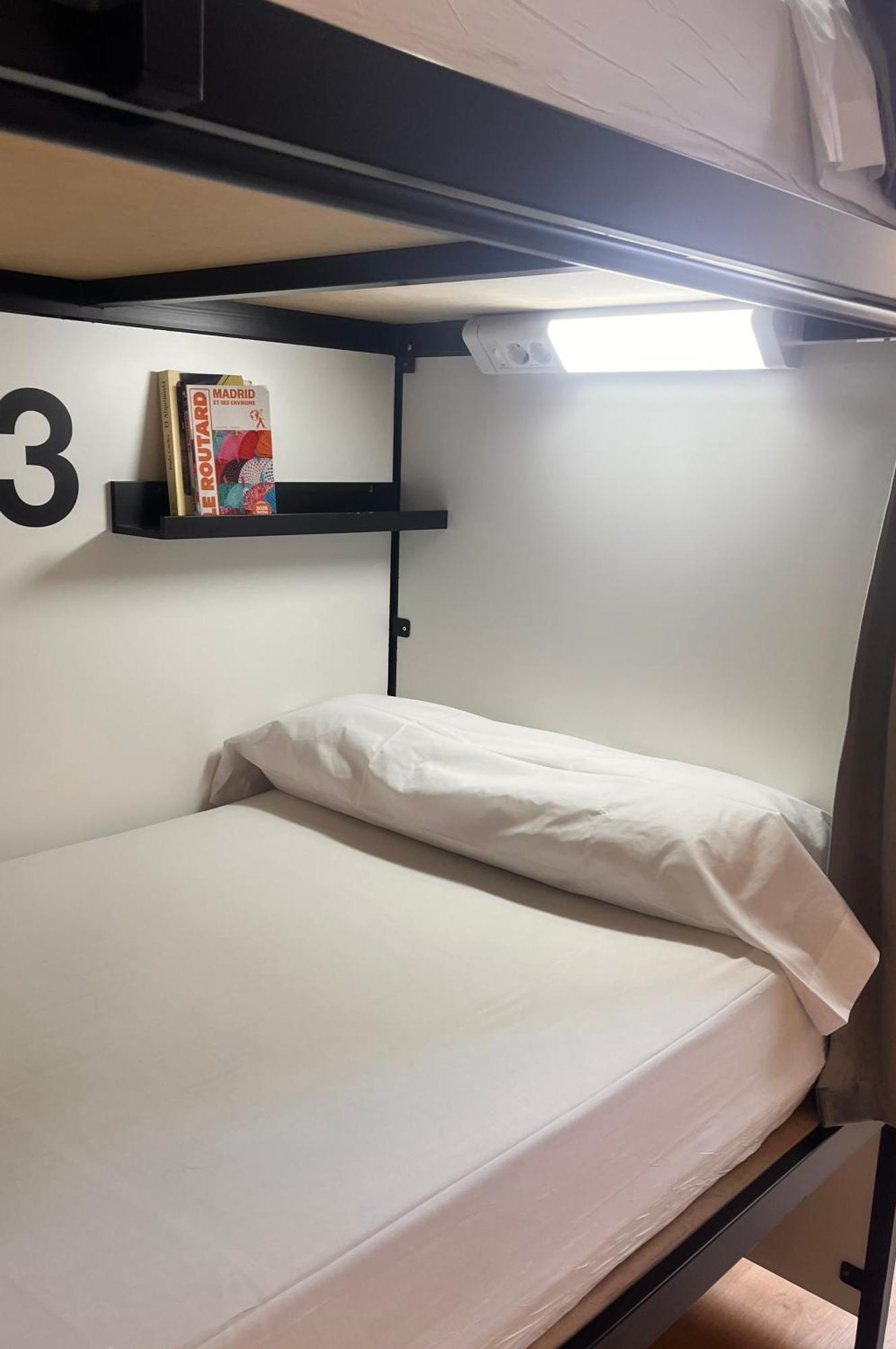Cama Individual num Dormitório com 4 Camas